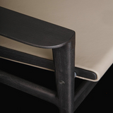 Sillón moderno con acento negro y versátil