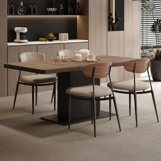 Mesa de comedor con pedestal y losa de piedra moderna