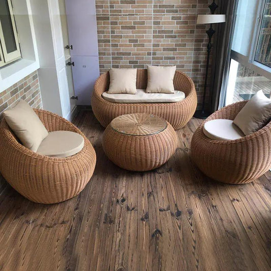 Silla de exterior de ratán tejido con forma de barril y asiento decorativo para patio